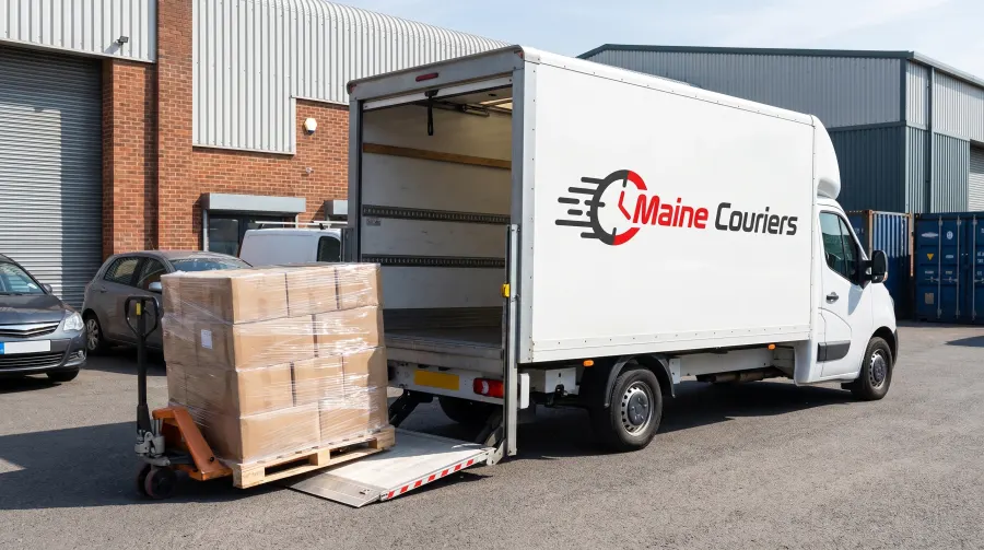 Pallet being loaded onto a Maine Couriers tail-lift van